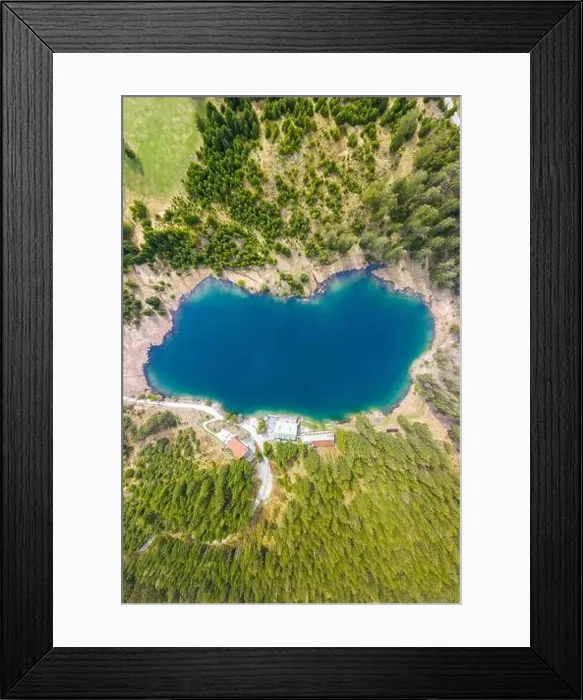 Framed Print : Top birds eye view to lake Frauensee surrounded of forest trees and house at shore Framed Print : Top birds eye view to lake Frauensee surrounded of forest trees and house at shore