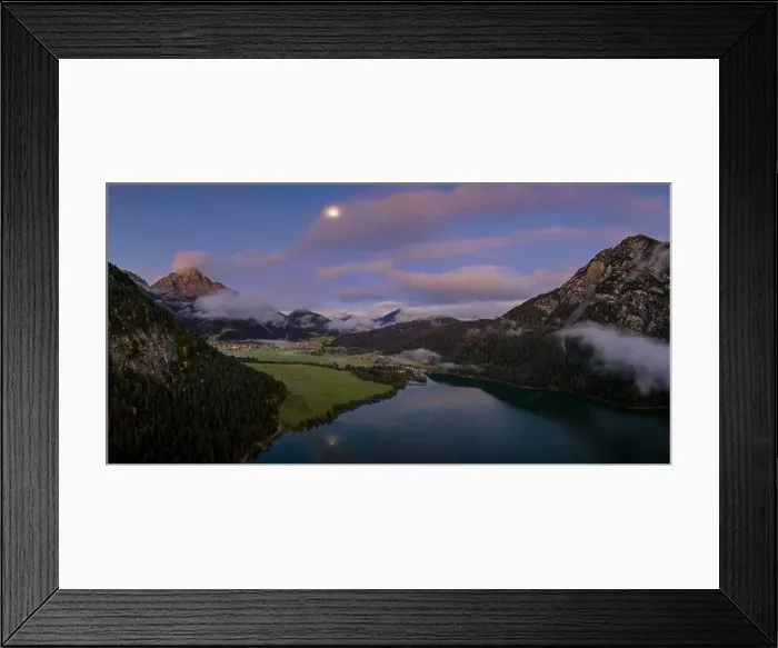 Framed Print : cloudy dawn sunrise at heiterwanger lake with oon and huge mountain thaneller Framed Print : cloudy dawn sunrise at heiterwanger lake with oon and huge mountain thaneller