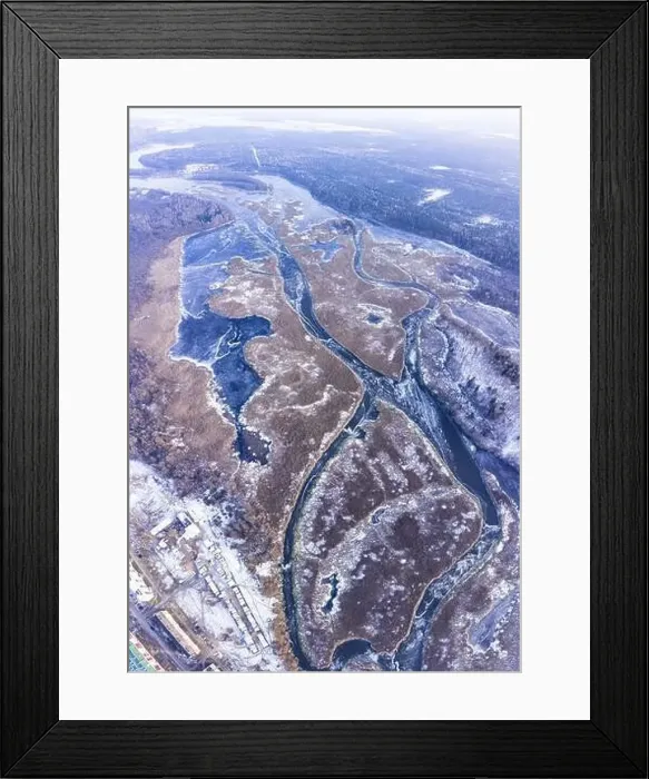 Framed Print : Aerial view on a frozen river landscape. Winter nature from a drone from above Framed Print : Aerial view on a frozen river landscape. Winter nature from a drone from above