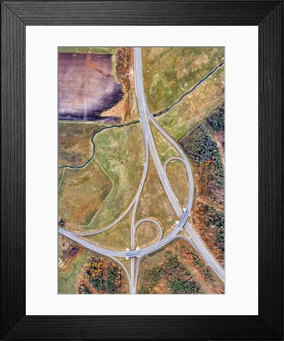 Framed Print : Beautiful aerial landscape with empty road, trees with red and orange leaves. Highway rural intersection Framed Print : Beautiful aerial landscape with empty road, trees with red and orange leaves. Highway rural intersection