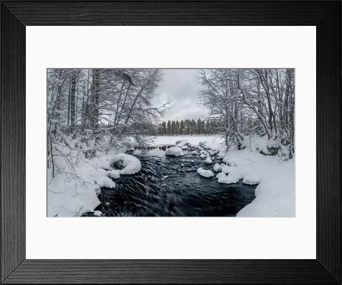 Framed Print : Flowing river in snowy winter landscape in Finland Framed Print : Flowing river in snowy winter landscape in Finland