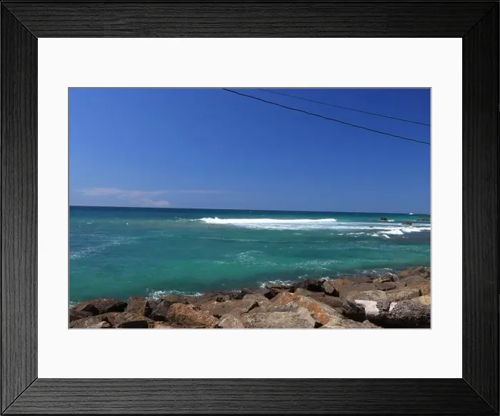 Framed Print : Fantastic Rocky coast. Sea waves impact rocky on the beach Framed Print : Fantastic Rocky coast. Sea waves impact rocky on the beach