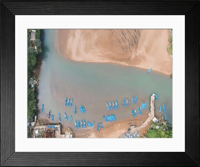 Framed Print : Top aerial view of traditional boats in lagoon beach in Indonesia Framed Print : Top aerial view of traditional boats in lagoon beach in Indonesia