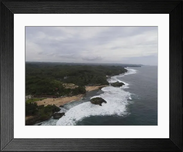 Framed Print : Aerial view of Baron beach in Yogyakarta, Indonesia with lighthouse and traditional boats Framed Print : Aerial view of Baron beach in Yogyakarta, Indonesia with lighthouse and traditional boats