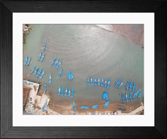Framed Print : Top aerial view of traditional boats in lagoon beach in Indonesia Framed Print : Top aerial view of traditional boats in lagoon beach in Indonesia
