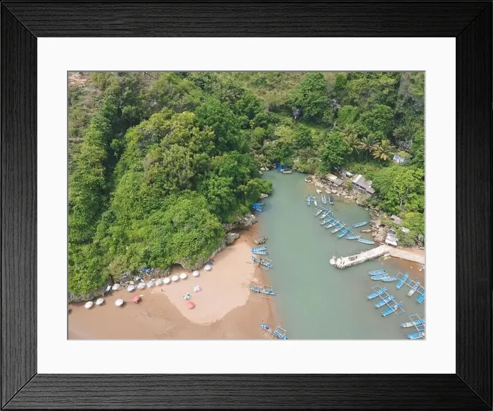 Framed Print : Aerial view of Baron beach in Yogyakarta, Indonesia with lighthouse and traditional boats Framed Print : Aerial view of Baron beach in Yogyakarta, Indonesia with lighthouse and traditional boats
