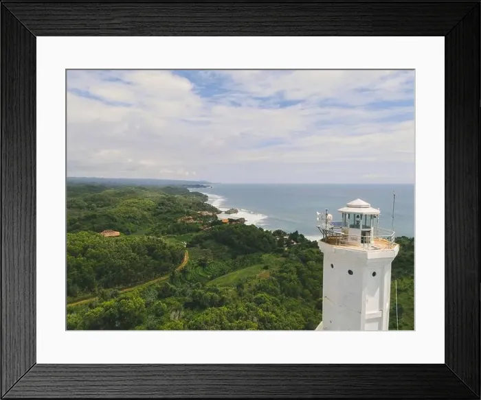 Framed Print : Aerial view of Baron beach in Yogyakarta, Indonesia with lighthouse and traditional boats Framed Print : Aerial view of Baron beach in Yogyakarta, Indonesia with lighthouse and traditional boats