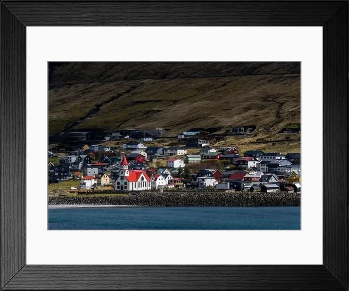 Framed Print : A beautiful white and red church in a small village in Faroe Islands Framed Print : A beautiful white and red church in a small village in Faroe Islands