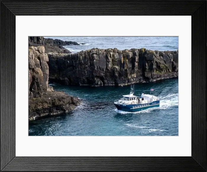 Framed Print : Ferry passes dramatic cliffs on its way to dock Framed Print : Ferry passes dramatic cliffs on its way to dock