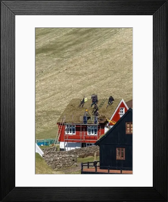 Framed Print : The roofers taking a rest on top of the roof of a house in Faroe Islands Framed Print : The roofers taking a rest on top of the roof of a house in Faroe Islands