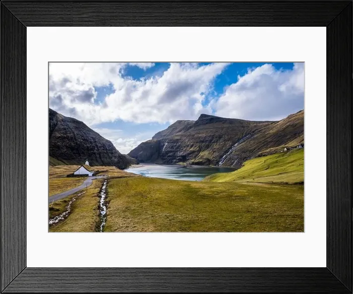Framed Print : A picturesque path leading to a church and a lake, in Saksun, Faroe Islands Framed Print : A picturesque path leading to a church and a lake, in Saksun, Faroe Islands
