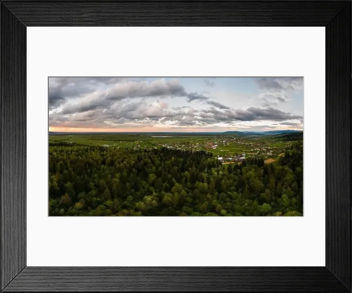 Framed Print : Aerial view of dark mountain hills covered with green mixed pine and lush forest in evening Framed Print : Aerial view of dark mountain hills covered with green mixed pine and lush forest in evening