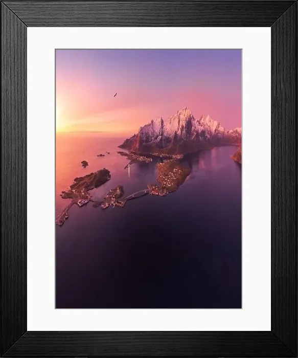 Framed Print : Aerial landscape of calm river and rocky formations located in Hamnoy under sunset sky in evening Framed Print : Aerial landscape of calm river and rocky formations located in Hamnoy under sunset sky in evening