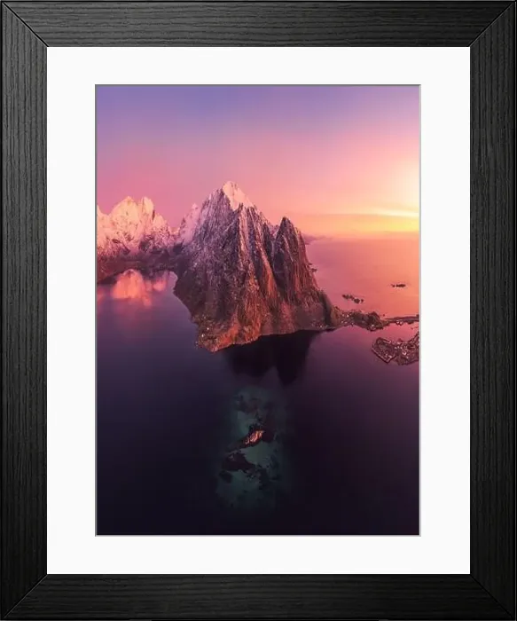 Framed Print : Picturesque scenery from drone of snowy mountains and calm sea under cloudless sky in Norway in evening Framed Print : Picturesque scenery from drone of snowy mountains and calm sea under cloudless sky in Norway in evening