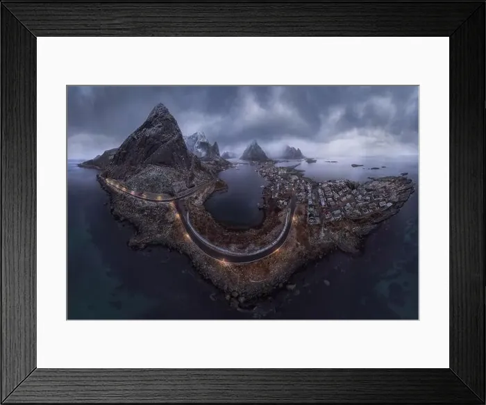 Framed Print : Aerial view of calm water of sea washing island with rocky formations under cloudy sky Framed Print : Aerial view of calm water of sea washing island with rocky formations under cloudy sky