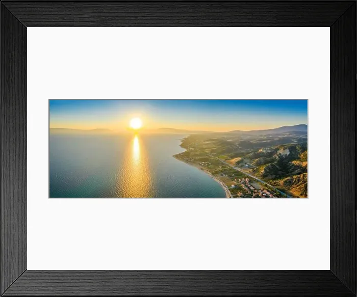 Framed Print : Aerial panorama of a small Greek village on the coast of the Mediterranean sea Framed Print : Aerial panorama of a small Greek village on the coast of the Mediterranean sea