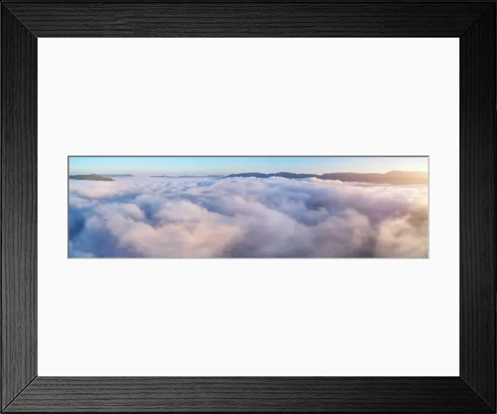 Framed Print : Aerial view white clouds in mountain and blue sky at morning. Top cloudscape view from drone Framed Print : Aerial view white clouds in mountain and blue sky at morning. Top cloudscape view from drone