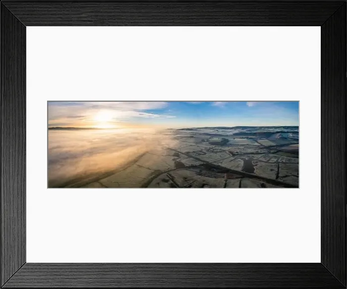 Framed Print : Sunrise over Marshland and River Exe in fog, RSPB Exminster and Powderham Marshe from a drone, Exeter, Devon, England Framed Print : Sunrise over Marshland and River Exe in fog, RSPB Exminster and Powderham Marshe from a drone, Exeter, Devon, England
