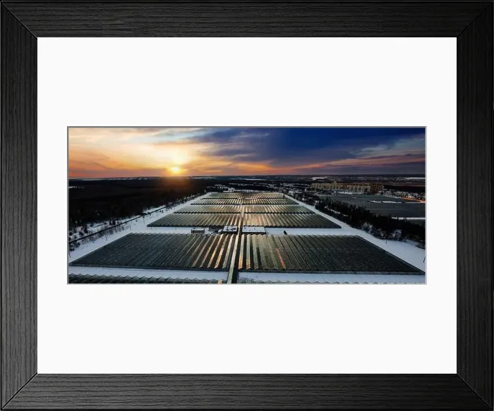 Framed Print : Aerial view of modern glass greenhouses in winter Framed Print : Aerial view of modern glass greenhouses in winter