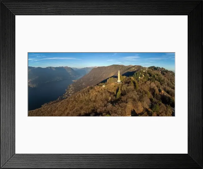 Framed Print : Aerial panoramic drone view of a lighthouse over Lake Como skyline with sunset light - Faro Voltiano (Volta Lighthouse) Framed Print : Aerial panoramic drone view of a lighthouse over Lake Como skyline with sunset light - Faro Voltiano (Volta Lighthouse)