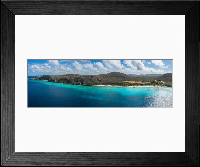 Framed Print : Aerial view of coast scenery with the ocean, cliff, and beach around Porto Mari area, Curacao, Caribbean Framed Print : Aerial view of coast scenery with the ocean, cliff, and beach around Porto Mari area, Curacao, Caribbean
