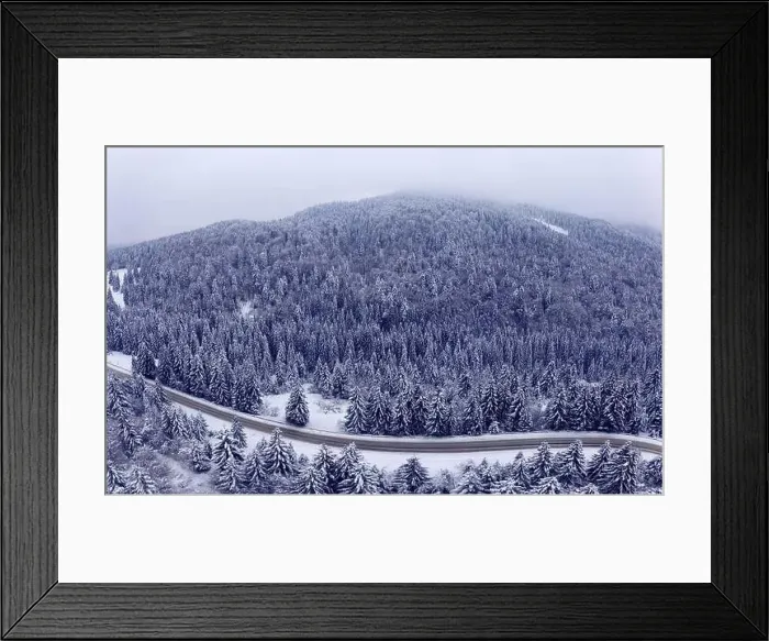 Framed Print : Aerial view of a curved mountain road Aerial view of a curved mountain road in Europe