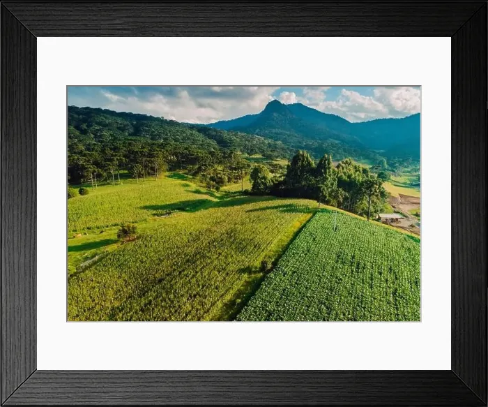 Framed Print : Aerial view of a rural area with mountains Framed Print : Aerial view of a rural area with mountains