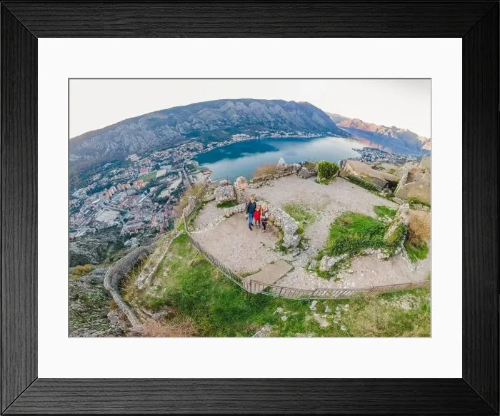 Framed Print : Family of hikers on Hiking in Kotor Old Town Ladder of Kotor Fortress Hiking Trail. Aerial drone view