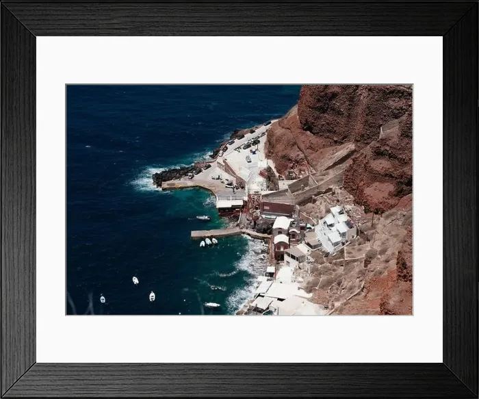 Framed Print : Top view of port with boats and mountain rocks of Oia Framed Print : Top view of port with boats and mountain rocks of Oia
