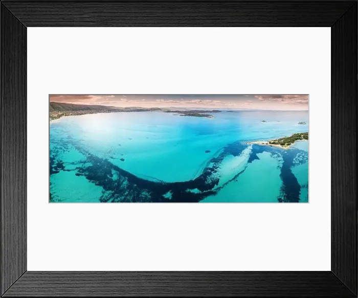 Framed Print : Aerial view of the paradise seashore with various shades of turquoise water Framed Print : Aerial view of the paradise seashore with various shades of turquoise water