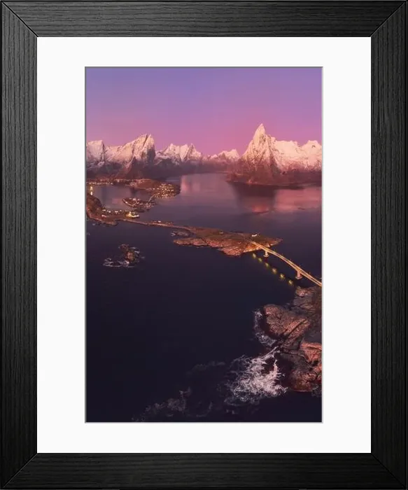Framed Print : Aerial landscape of calm river and rocky formations located in Hamnoy under sunset sky in evening Framed Print : Aerial landscape of calm river and rocky formations located in Hamnoy under sunset sky in evening