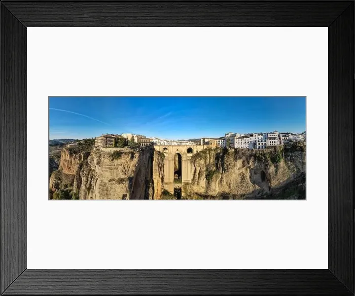 Framed Print : Drone view at the old bridge of Ronda on Andalusia in Spain Framed Print : Drone view at the old bridge of Ronda on Andalusia in Spain