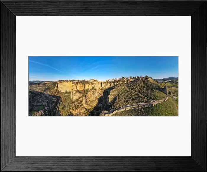 Framed Print : Drone view at the old bridge of Ronda on Andalusia in Spain Framed Print : Drone view at the old bridge of Ronda on Andalusia in Spain