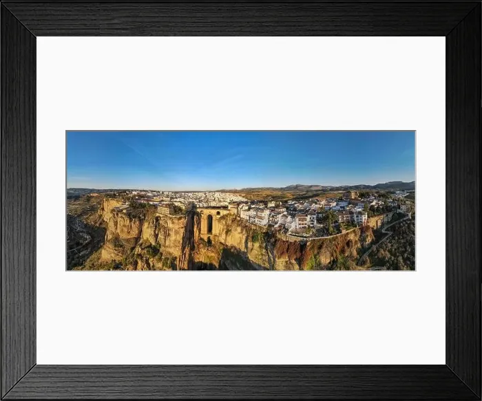 Framed Print : Drone view at the old bridge of Ronda on Andalusia in Spain Framed Print : Drone view at the old bridge of Ronda on Andalusia in Spain