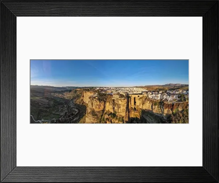 Framed Print : Drone view at the old bridge of Ronda on Andalusia in Spain Framed Print : Drone view at the old bridge of Ronda on Andalusia in Spain