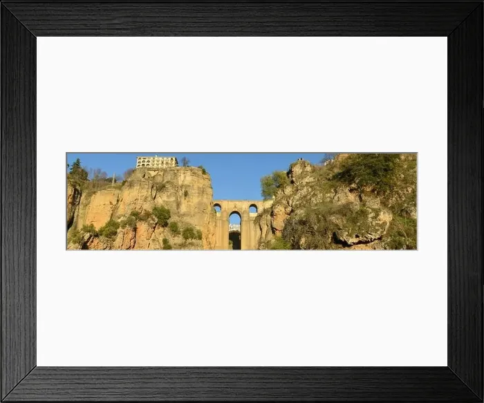 Framed Print : View at the old bridge of Ronda on Andalusia in Spain Framed Print : View at the old bridge of Ronda on Andalusia in Spain