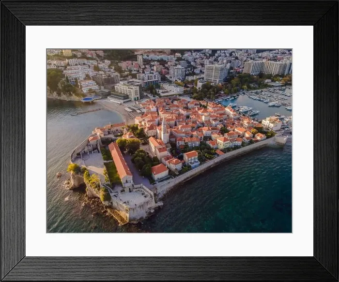 Framed Print : Old town in Budva in a beautiful summer day, Montenegro. Aerial image. Top view Framed Print : Old town in Budva in a beautiful summer day, Montenegro. Aerial image. Top view