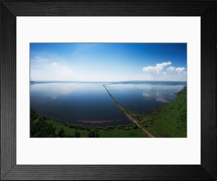 Framed Print : Aerial drone view of lake landscape with road Framed Print : Aerial drone view of lake landscape with road