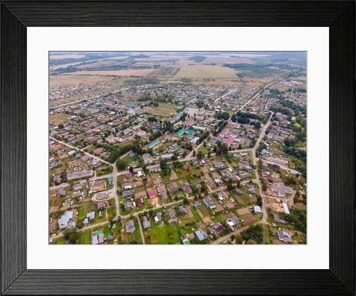 Framed Print : Residential buildings between roads and lawns in suburb Framed Print : Residential buildings between roads and lawns in suburb