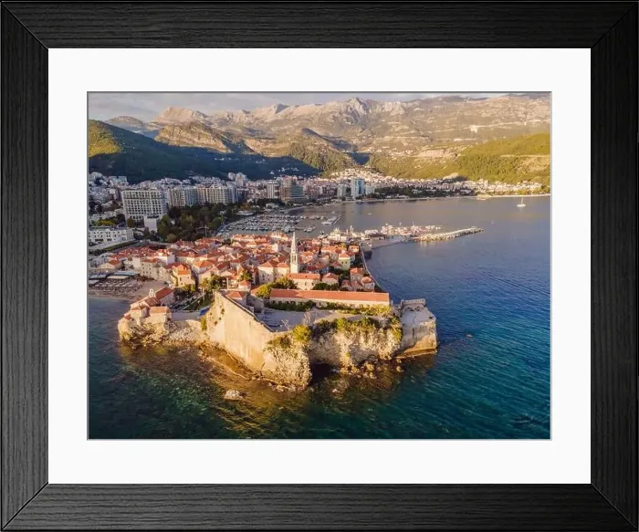 Framed Print : Old town in Budva in a beautiful summer day, Montenegro. Aerial image. Top view Framed Print : Old town in Budva in a beautiful summer day, Montenegro. Aerial image. Top view