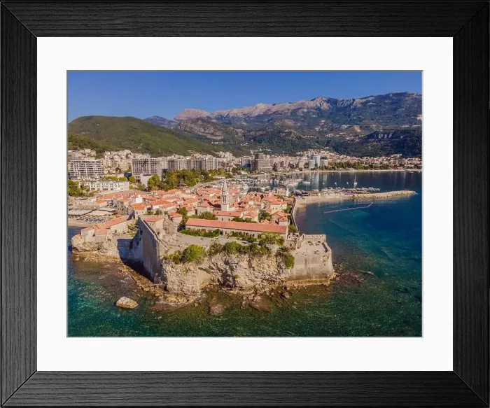 Framed Print : Old town in Budva in a beautiful summer day, Montenegro. Aerial image. Top view Framed Print : Old town in Budva in a beautiful summer day, Montenegro. Aerial image. Top view