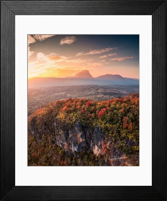 Framed Print : Aerial view of sunset over Doi Luang Chiang Dao mountain range with colorful autumn forest on hill in countryside