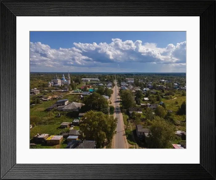 Framed Print : Scenery of village with houses on sunny day Framed Print : Scenery of village with houses on sunny day