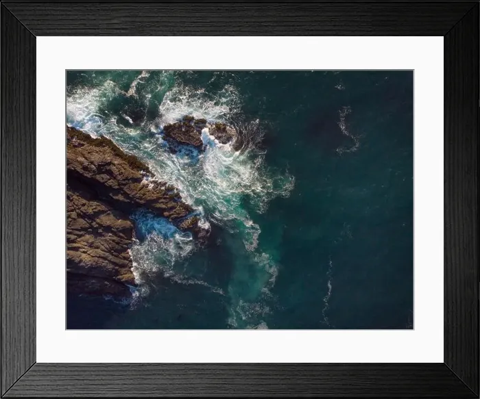 Framed Print : Aerial view. Seascape. Clear turquoise ocean water with white foamy waves and rocky shore Framed Print : Aerial view. Seascape. Clear turquoise ocean water with white foamy waves and rocky shore