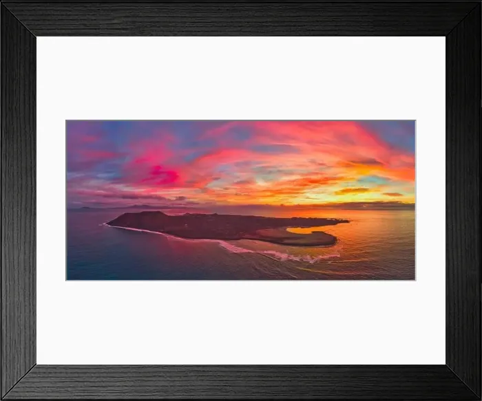 Framed Print : Aerial panoramic image of a dramatic sunrise over Lobos island Corralejo Fuerteventura Framed Print : Aerial panoramic image of a dramatic sunrise over Lobos island Corralejo Fuerteventura
