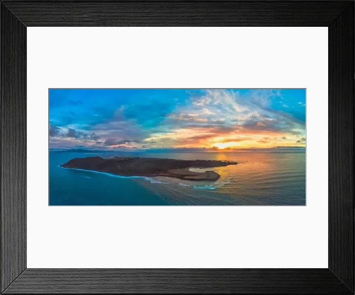 Framed Print : Beautiful aerial panoramic image of the sunrise over Lobos island Corralejo Fuerteventura Framed Print : Beautiful aerial panoramic image of the sunrise over Lobos island Corralejo Fuerteventura
