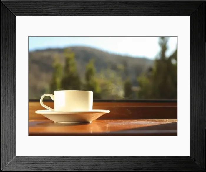 Framed Print : Cup of tea stands on wooden windowsill Framed Print : Cup of tea stands on wooden windowsill