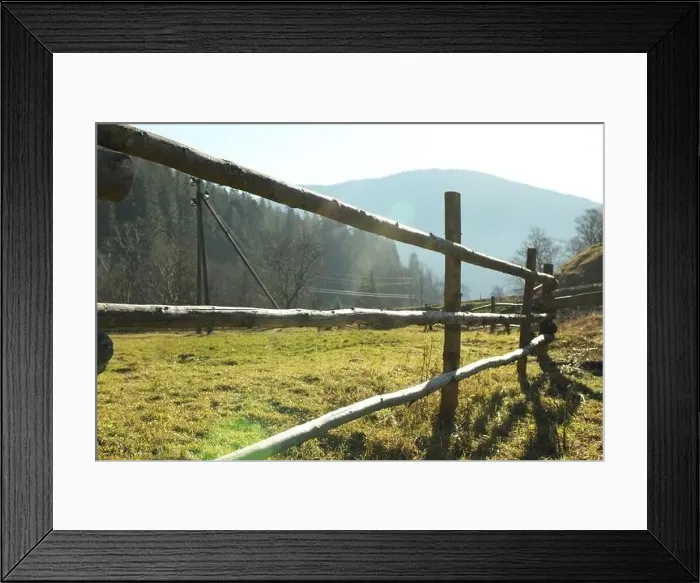 Framed Print : Wooden fence in Carpathian mountains in sunny day Framed Print : Wooden fence in Carpathian mountains in sunny day
