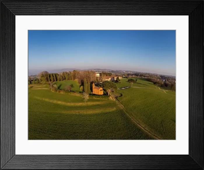 Framed Print : Aerial drone shot. Red church of Pomelasca at sunset - Lombardy countryside panorama, Inverigo, province of Como, Italy Framed Print : Aerial drone shot. Red church of Pomelasca at sunset - Lombardy countryside panorama, Inverigo, province of Como, Italy