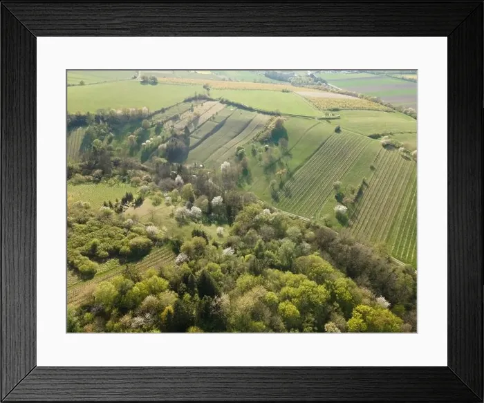 Framed Print : Drone flight over green meadows, forests, landscape, nature in April in Austria Framed Print : Drone flight over green meadows, forests, landscape, nature in April in Austria